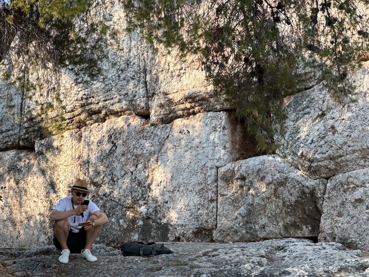 Rick at the foot of a cyclopean wall on the Pnyx, Athens